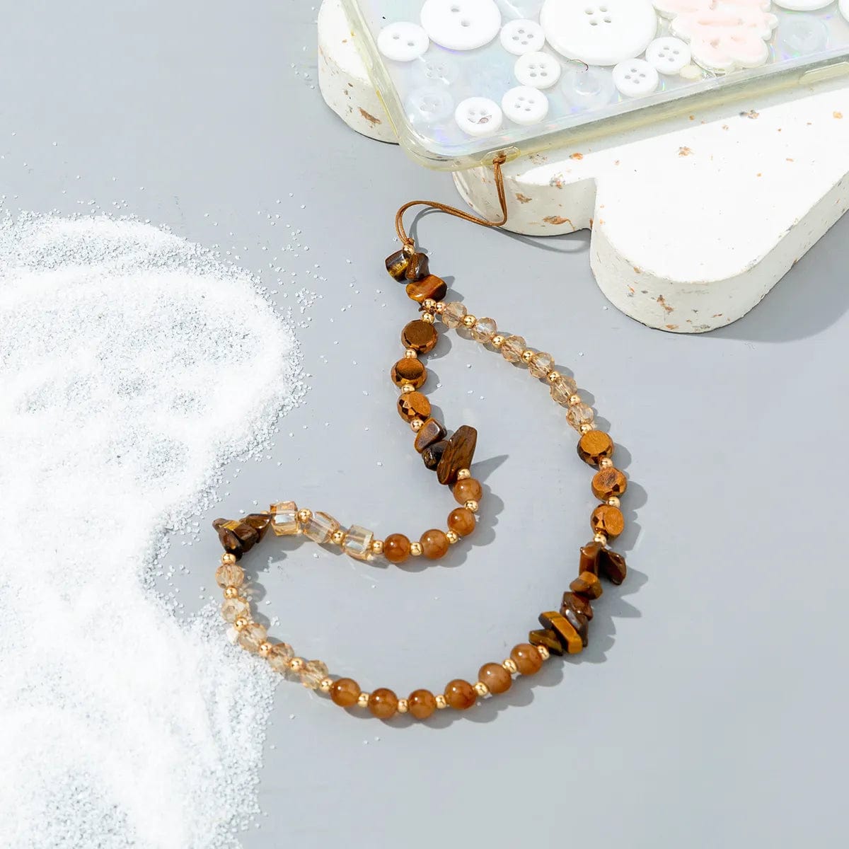 Braune Perlen-Handykette mit mokkafarbenen Steinen